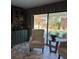 Relaxing sunroom with pool view and comfortable seating at 825 E Lakeshore Blvd, Kissimmee, FL 34744