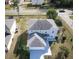 Two-story house with a garage and a yard at 945 Gateshead Ct, Kissimmee, FL 34758