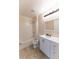 Clean bathroom with white vanity and tiled floors at 945 Gateshead Ct, Kissimmee, FL 34758