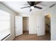 Well-lit bedroom with ceiling fan and two closets at 945 Gateshead Ct, Kissimmee, FL 34758