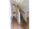 Bright entryway with staircase and wood-look floors at 945 Gateshead Ct, Kissimmee, FL 34758