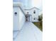 Light blue house with walkway leading to front entrance at 945 Gateshead Ct, Kissimmee, FL 34758