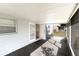 Screened-in porch with concrete flooring and access to backyard at 945 Gateshead Ct, Kissimmee, FL 34758