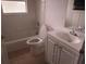 Clean bathroom with a tub, toilet, and vanity at 1005 Tequesta Trl, Lake Wales, FL 33898