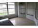 Bright dining area with large windows and tile floors at 1005 Tequesta Trl, Lake Wales, FL 33898