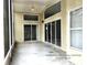 Spacious screened porch with access to the backyard at 1005 Tequesta Trl, Lake Wales, FL 33898