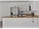 Modern kitchen with granite countertops and island at 10420 Vista Del Sol Cir, Clermont, FL 34711