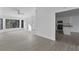 Open concept living area with kitchen view and hardwood floors at 10420 Vista Del Sol Cir, Clermont, FL 34711