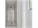 Modern shower with marble tile surround at 10420 Vista Del Sol Cir, Clermont, FL 34711
