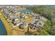 Aerial view of a beautiful community with lake and houses at 11120 Robert Frost Dr, Winter Garden, FL 34787