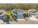 Two-story house in a residential neighborhood with a large yard at 11120 Robert Frost Dr, Winter Garden, FL 34787