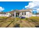 House with covered patio and fenced backyard at 11120 Robert Frost Dr, Winter Garden, FL 34787