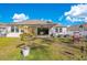 House with covered patio and fenced backyard at 11120 Robert Frost Dr, Winter Garden, FL 34787