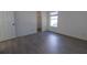 Bright bedroom with gray flooring and a closet at 1161 Kempton Chase Pkwy, Orlando, FL 32837