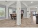 Spacious dining room with large table and chairs, hardwood floors, and neutral walls at 12814 Westside Village Loop, Windermere, FL 34786