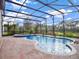 Large pool and spa with screened enclosure at 12814 Westside Village Loop, Windermere, FL 34786