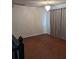 Bright bedroom with hardwood floors and neutral walls at 1424 Sophie Way, Kissimmee, FL 34744