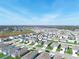 Aerial view showing a single-Gathering home in a residential neighborhood at 1521 Majestic Ln, Winter Haven, FL 33880