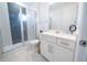 Modern bathroom with white vanity and glass shower at 16548 Raven Rock Pl, Winter Garden, FL 34787