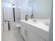 Clean bathroom with white vanity and a bathtub at 16548 Raven Rock Pl, Winter Garden, FL 34787