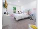 Spacious bedroom with a queen bed and window at 16548 Raven Rock Pl, Winter Garden, FL 34787