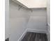 Spacious closet with wood-look flooring and custom shelving at 16548 Raven Rock Pl, Winter Garden, FL 34787