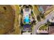 Aerial view of community pool and surrounding amenities at 16548 Raven Rock Pl, Winter Garden, FL 34787
