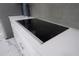 Modern kitchen cooktop with sleek design at 16548 Raven Rock Pl, Winter Garden, FL 34787