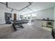Spacious game room with pool table, wet bar, and seating at 16548 Raven Rock Pl, Winter Garden, FL 34787