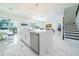 Modern kitchen with large island and stainless steel appliances at 16548 Raven Rock Pl, Winter Garden, FL 34787