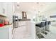 Modern kitchen with large island and stainless steel appliances at 16548 Raven Rock Pl, Winter Garden, FL 34787