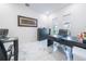 Bright home office with large desk and ample natural light at 16548 Raven Rock Pl, Winter Garden, FL 34787