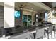 Stainless steel outdoor kitchen with granite countertops at 16548 Raven Rock Pl, Winter Garden, FL 34787