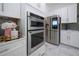 Double oven with microwave, stainless steel finish at 16548 Raven Rock Pl, Winter Garden, FL 34787