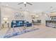 Bright and airy living area with an open floor plan and a view of the kitchen at 17354 Blessing Dr, Clermont, FL 34714