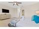 Main bedroom with king-size bed and plenty of natural light at 17354 Blessing Dr, Clermont, FL 34714