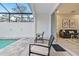 Enjoy this relaxing pool area, complete with patio furniture and a screened enclosure at 17354 Blessing Dr, Clermont, FL 34714