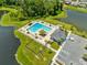 Aerial view showing community pool, dog park, and parking area at 1791 Yellow Trl, Lakeland, FL 33801