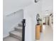 Bright entryway with stairs, console table, and mirror at 1791 Yellow Trl, Lakeland, FL 33801