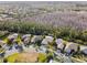 Aerial view of neighborhood with homes and nature preserve at 190 Verona Dr, Kissimmee, FL 34759