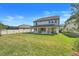 House with covered patio and large backyard at 2230 Standing Rock Cir, Oakland, FL 34787