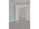 Empty bedroom with tile flooring and white doors at 2230 Standing Rock Cir, Oakland, FL 34787