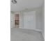 Bedroom with gray carpet, double doors, and a view of the upper loft at 2230 Standing Rock Cir, Oakland, FL 34787