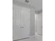White double-door closet with simple design at 2230 Standing Rock Cir, Oakland, FL 34787