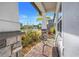 Front porch with metal bench and view of neighborhood at 2230 Standing Rock Cir, Oakland, FL 34787