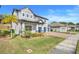 Two story house with landscaped front yard at 2230 Standing Rock Cir, Oakland, FL 34787
