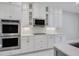 Modern kitchen with double oven and cooktop at 2230 Standing Rock Cir, Oakland, FL 34787