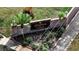 Elegant brick sign for Hidden Glen community entrance with manicured landscaping and decorative lighting at 2417 Liela Lee Ct, Ocoee, FL 34761