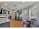 Spacious kitchen area with stainless steel refrigerator and breakfast nook at 2417 Liela Lee Ct, Ocoee, FL 34761