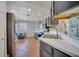 Bright kitchen with stainless steel appliances, modern backsplash, and recessed lighting at 2417 Liela Lee Ct, Ocoee, FL 34761